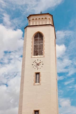 Photo of a white tower. Architecture is often done by experts alone, what we call "Ivory Tower Architecture". Although known not to work well, this architecture strategy remains wide-spread.