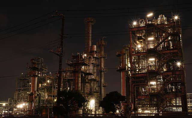 Picture of a factory running by night. Discussing big changes to the
existing, and running, system can be stressful for developers. A good
Event Storming tip is to make all the stress points
explicit.